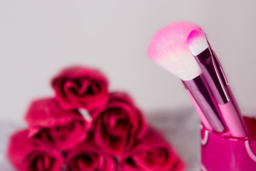 Image showing close-up pink professional cosmetic brush 