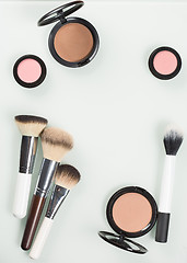 Image showing Set of professional cosmetic: make-up brushes, shadows, Front part.