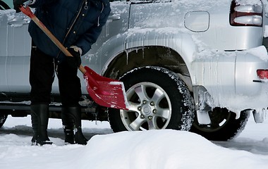 Image showing Man shoveling snow