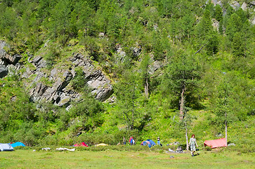 Image showing Tourist tents in camp in mountain