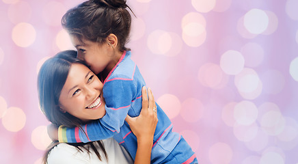 Image showing happy mother and daughter hugging