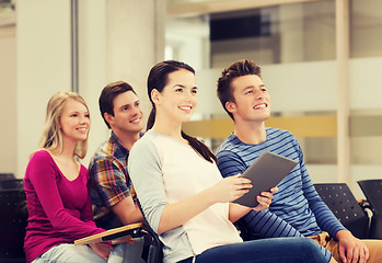 Image showing group of smiling students with tablet pc