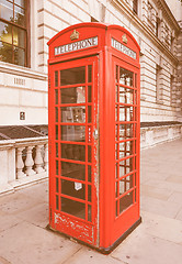 Image showing Retro looking Red phone box in London