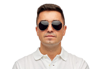 Image showing face of man in polo t-shirt and sunglasses