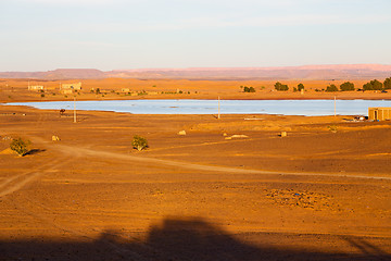 Image showing sunshine in the lake yellow morocco sand     dune