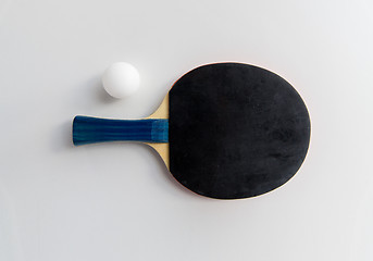 Image showing close up of table tennis rackets with ball