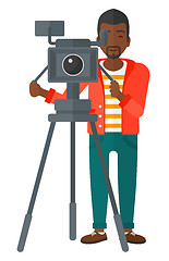 Image showing Cameraman with movie camera.