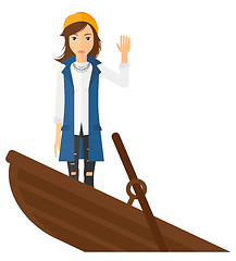 Image showing Business woman standing in sinking boat.