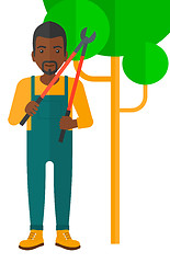 Image showing Farmer with pruner.