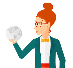 Image showing Woman holding globe.