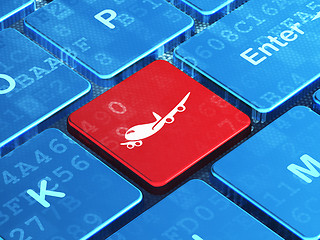 Image showing Vacation concept: Airplane on computer keyboard background