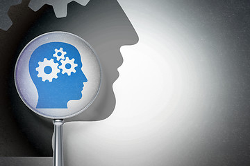 Image showing Education concept:  Head With Gears with optical glass on digital background