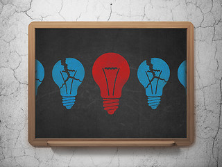 Image showing Business concept: light bulb icon on School Board background