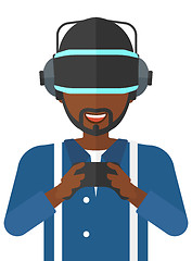Image showing Man in oculus rift and console in hands.