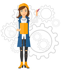Image showing Woman standing on gears background.