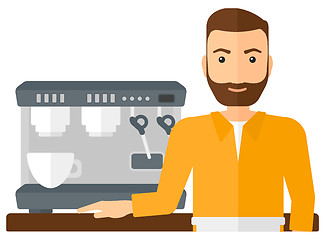 Image showing Barista standing near coffee maker.