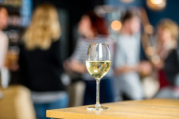 Image showing Closeup Of Wineglass On Table At Bar