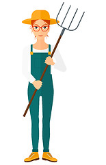 Image showing Farmer with pitchfork.