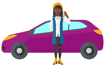 Image showing Woman holding key from new car.