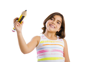 Image showing Girl writing on a glass wall