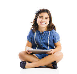 Image showing Young girl using a tablet