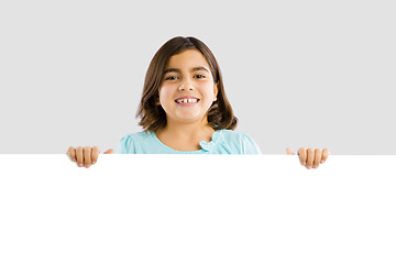 Image showing Girl holding a whiteboard