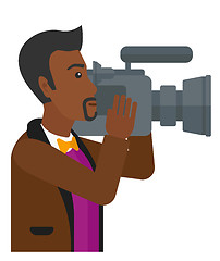 Image showing Cameraman with video camera.
