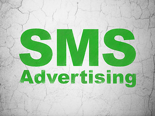 Image showing Advertising concept: SMS Advertising on wall background