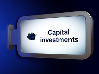 Image showing Currency concept: Capital Investments and Money Box on billboard background