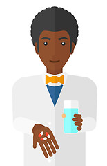 Image showing Pharmacist giving pills.