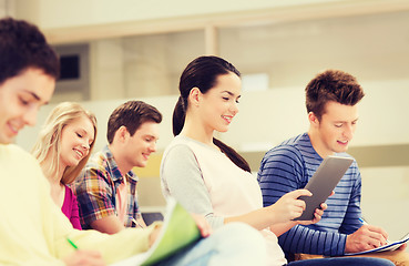 Image showing group of smiling students with tablet pc