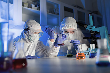 Image showing close up of scientists making test in lab