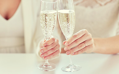 Image showing close up of lesbian couple with champagne glasses