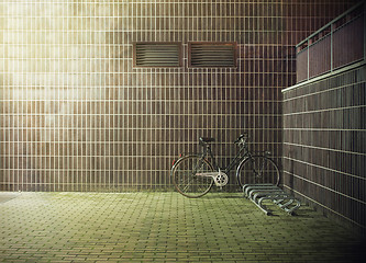 Image showing vintage bicycle near the concrete wall