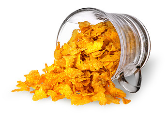 Image showing Cornflakes spill out of a glass cup