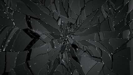 Image showing glass splitted or cracked on black