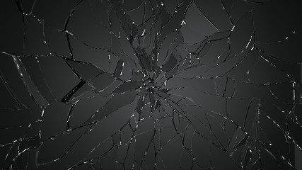 Image showing Pieces of shattered glass on black