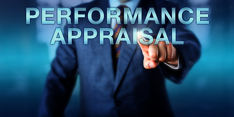 Image showing Manager Touching PERFORMANCE APPRAISAL Onscreen