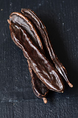 Image showing Ripe carob pods