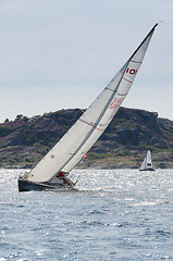 Image showing one sailing boat in a competition