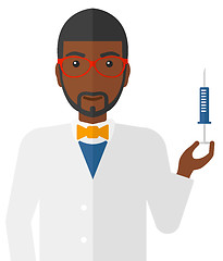 Image showing Doctor holding syringe.