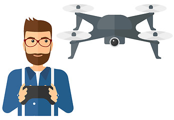 Image showing Man flying drone.