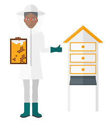 Image showing Bee-keeper at apiary.