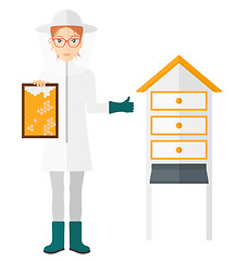 Image showing Bee-keeper at apiary.