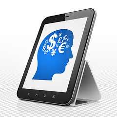 Image showing Finance concept: Tablet Computer with Head With Finance Symbol on display