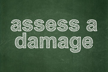 Image showing Insurance concept: Assess A Damage on chalkboard background