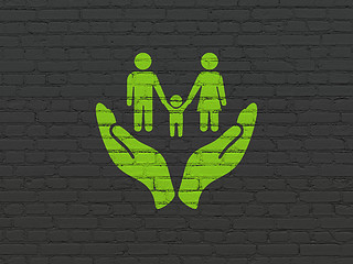 Image showing Insurance concept: Family And Palm on wall background