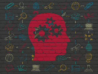 Image showing Learning concept: Head With Gears on wall background