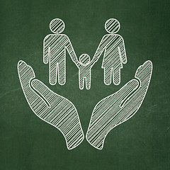 Image showing Insurance concept: Family And Palm on chalkboard background