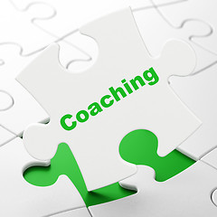 Image showing Learning concept: Coaching on puzzle background